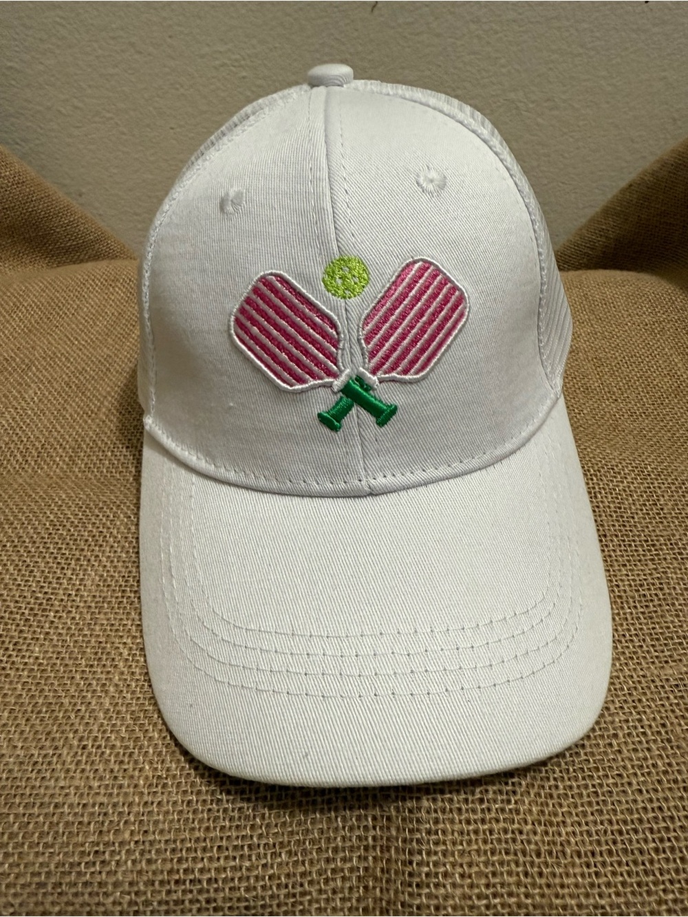 White Women's Mesh Trucker  Cap with Pink Pickle Ball Paddle Embroidery